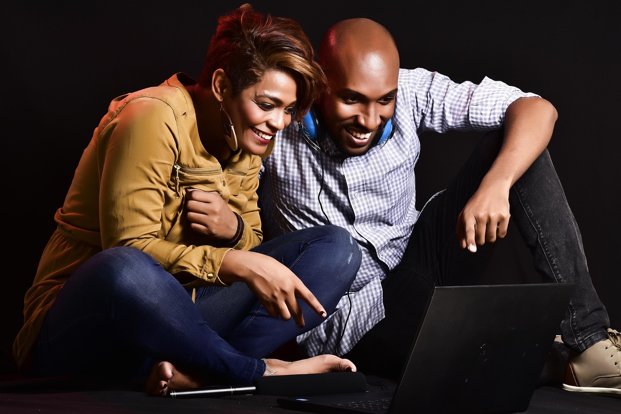 Couple enjoying entertainment at home