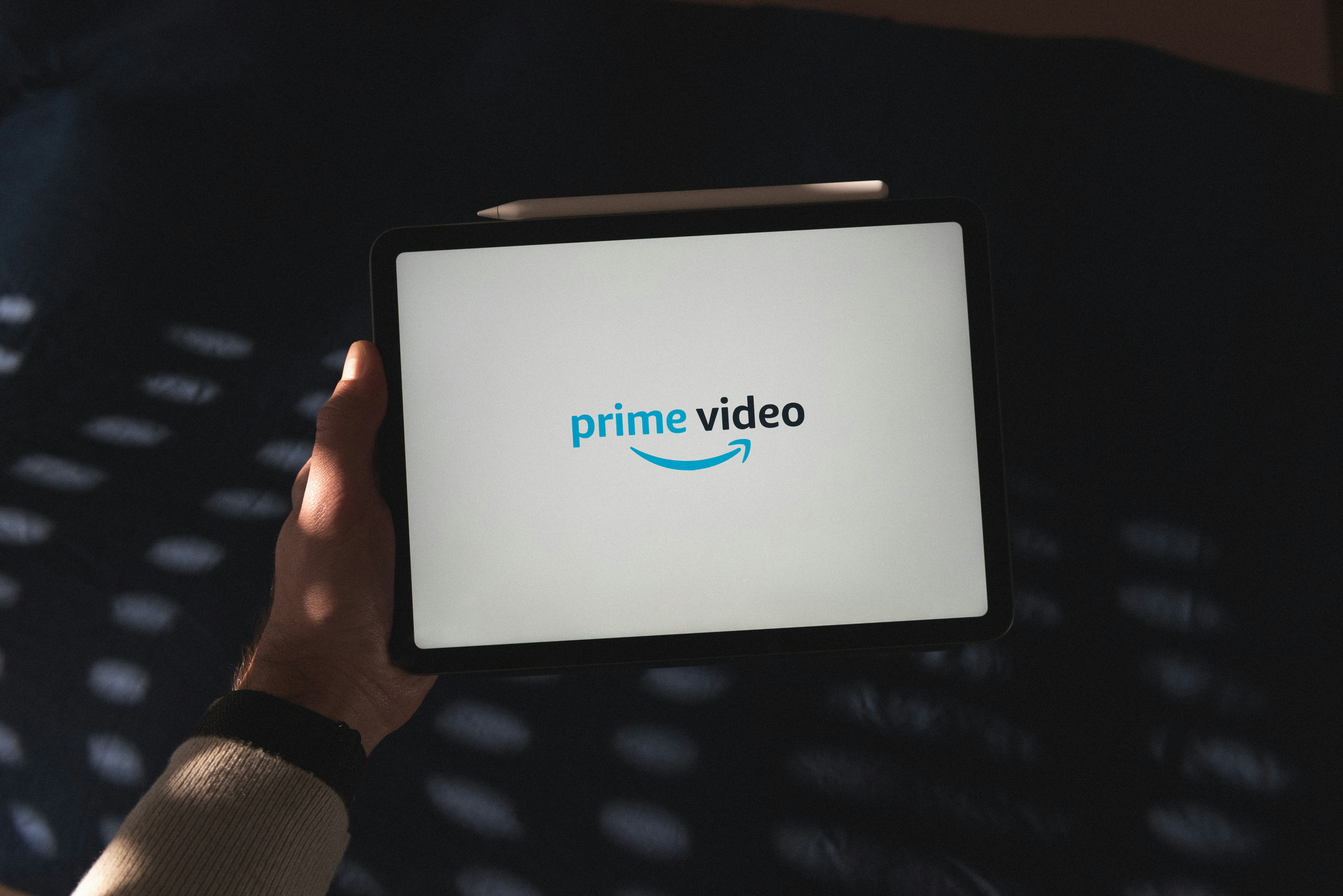 Person troubleshooting IPTV on a tablet