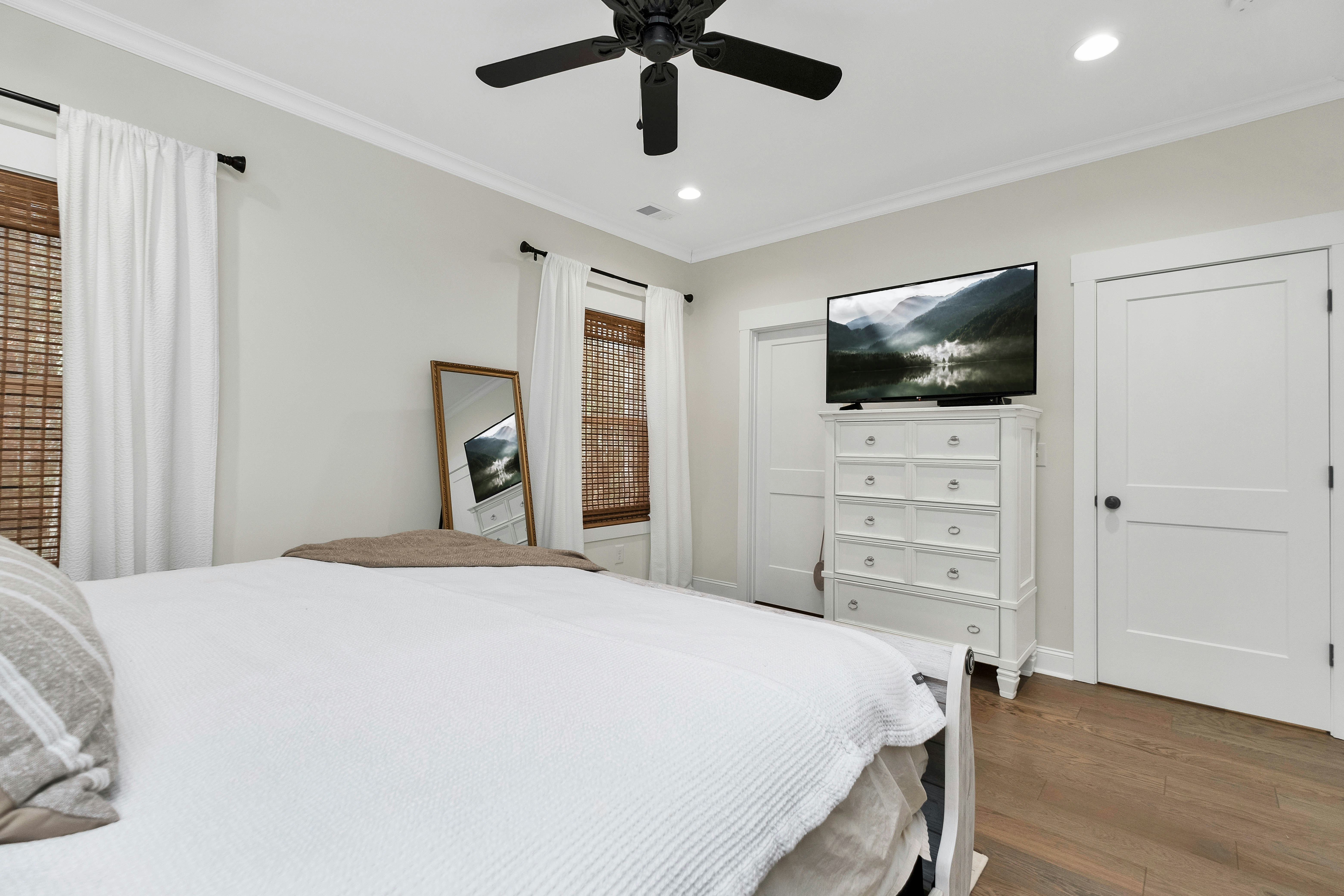 Modern bedroom with television setup