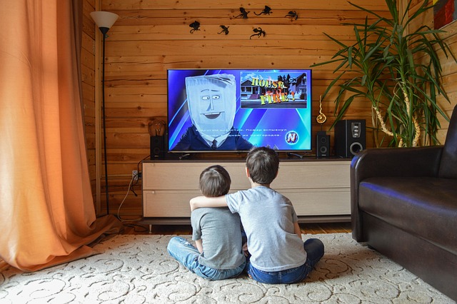 Family watching television together